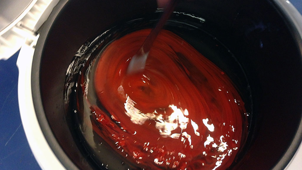 Mixing in the orange wax crayon